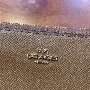 Brand new brown coach wristlet
